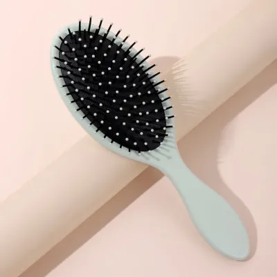 Щітка масажна